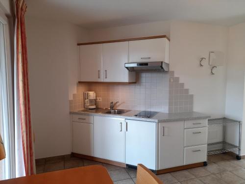 virtuve, Apartmenthaus am Waalweg in Caines