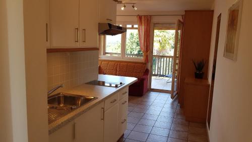 virtuve, Apartmenthaus am Waalweg in Caines