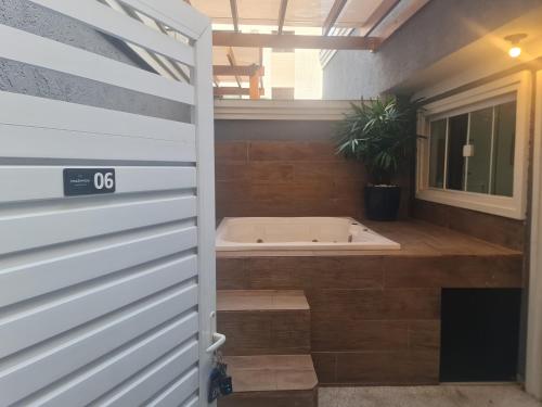 Marmeu Tombo com Hidro Aquecida Privativa in กวารุจ้า