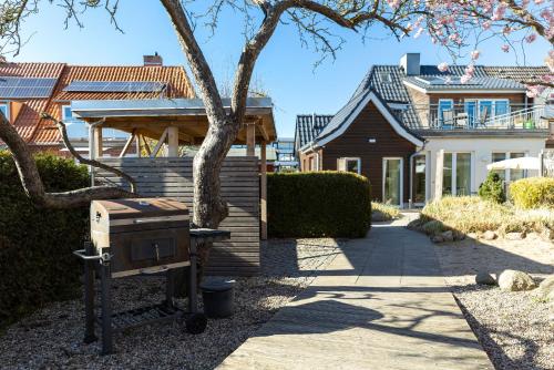 K2 Bungalow - Strandhaus Königsberger Allee 8 - FERIENDOMIZIL HOLLICH (K2 Bungalow - Strandhaus Konigsberger Allee 8 - FERIENDOMIZIL HOLLICH) in Громітц