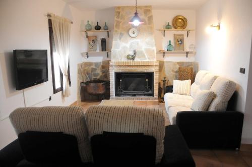 Koplietošanas atpūtas telpa ar TV, Casa Rural El Gallo in Casas de Fernando Alonso