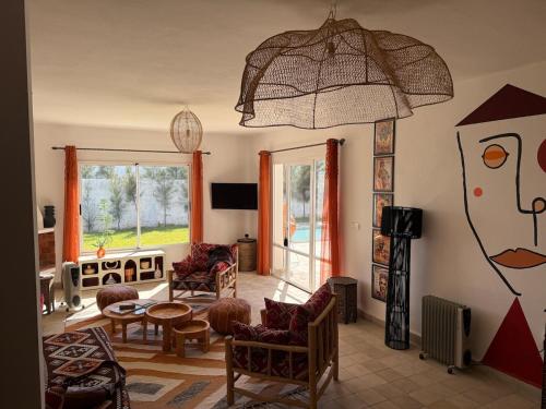 Koplietošanas atpūtas telpa ar TV, Villa BERBÈRE (Villa BERBERE) in Ghazoua
