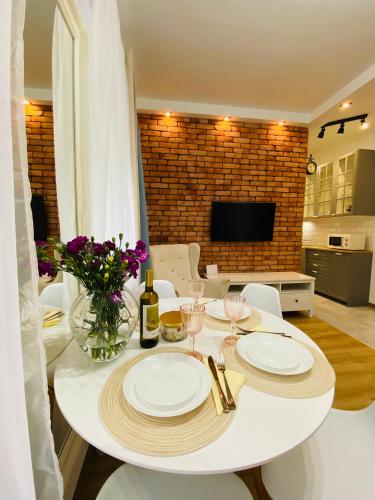 Przytulny apartament z tarasem in Ольштинек