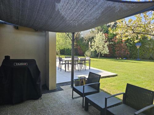 Kert, Maison Cosy Campagne, Terrasse & Spa in Touquin