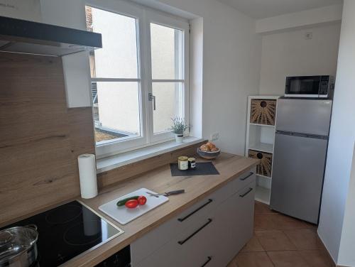 virtuve, Schwarzer Adler - Ferienwohnung Storchennest in Ipsheim