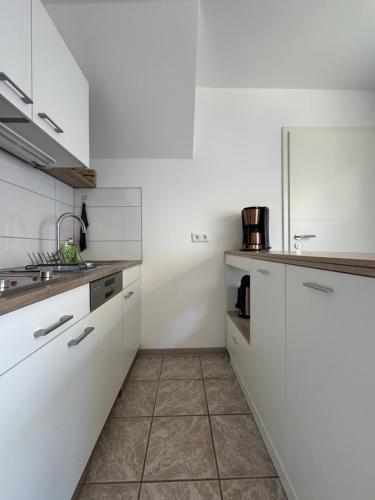 virtuve, Ferienwohnung im Haus am See in Seeblick