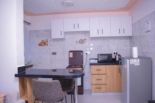 Marvel Homes Modern 1BR Fast WiFi Balcony Near Town Perfect for Work & Stay in Meru