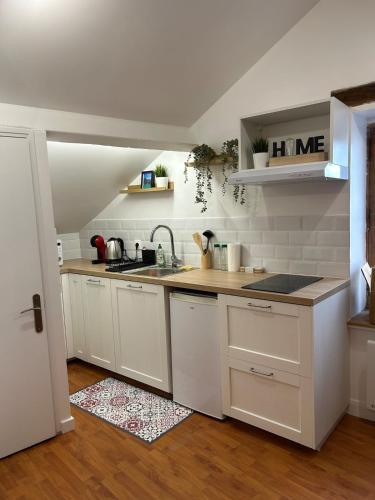 кухня, Appartement cosy à 20 min de Disney (Appartement cosy a 20 min de Disney) in Озуар-ла-Фер'єр