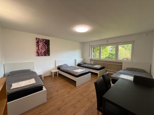Wohnung Niedernhausen 60 qm 7 Einzelbetten Stellplatz in นีเดอร์เฮาเซน