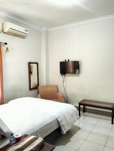 Nakula Familiar Inn Room Type - Queen Room
