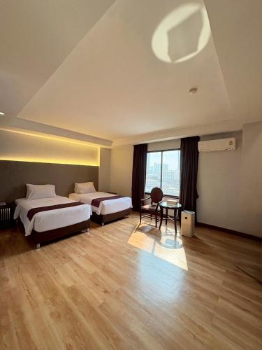 Atrium Boutique Hotel Room Type - Studio with twin bed
