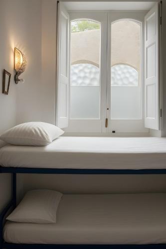 Single Bed in Female Dormitory Room