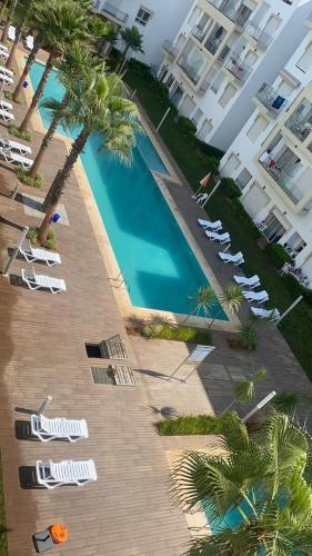 Appartement bouznika kettani avec jardin privé accés direct à la piscine (Appartement bouznika kettani avec jardin prive acces direct a la piscine) in Bouznika