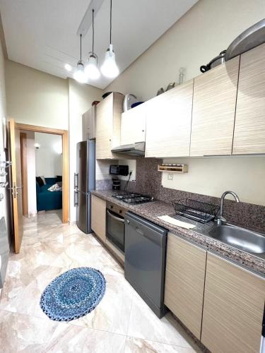 Appartement bouznika kettani avec jardin privé accés direct à la piscine (Appartement bouznika kettani avec jardin prive acces direct a la piscine) in Bouznika