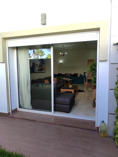 Appartement bouznika kettani avec jardin privé accés direct à la piscine (Appartement bouznika kettani avec jardin prive acces direct a la piscine) in Bouznika