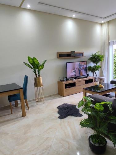 Appartement bouznika kettani avec jardin privé accés direct à la piscine (Appartement bouznika kettani avec jardin prive acces direct a la piscine) in Bouznika