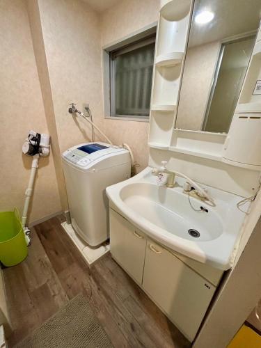 Two devided rooms with three large beds close to Nipponbashi - Tap to explore photos