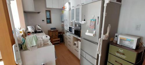 Kitchen, ペット可 Clear Up Guest House in Takatsuki