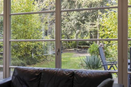 สวน, Relaxen in het bos met privésauna (Relaxen in het bos met privesauna) in โฮลเตน