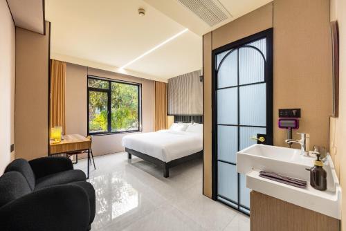 珠珠酒店上海浦东机场店Shanghai Zhuzhu Hotel - 24-hour free airport pick-up and drop-off Airport, 24-hour professional butler service, spacious room layout with great sense of space, complete kitchen facilities, relaxing spa massage service, Shanghai (Foto 4)