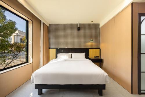 珠珠酒店上海浦东机场店Shanghai Zhuzhu Hotel - 24-hour free airport pick-up and drop-off Airport, 24-hour professional butler service, spacious room layout with great sense of space, complete kitchen facilities, relaxing spa massage service, Shanghai (Foto 3)