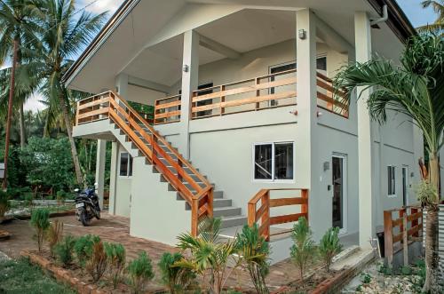 Casa de  m2 amb 1 habitació i 1 bany privat a San Juan (TABI Beach Road Flats) in Illa Siquijor