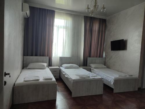 Single Bed in Dormitory Room