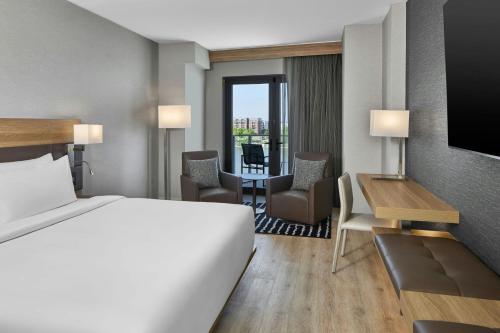 Riverfront King Room with Balcony image 3
