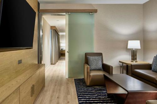 One-Bedroom King Suite with Sofa Bed room in AC Hotel Savannah Historic District