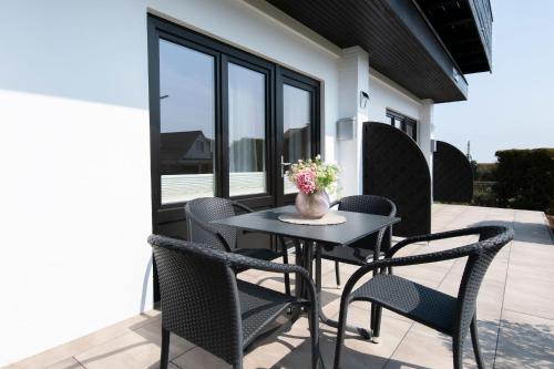 Haus an der See Seemuschel in 靼门