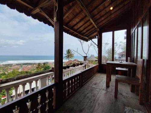 Balcony/terrace, Villa Joglo Paris Yogyakarta in Parangtritis