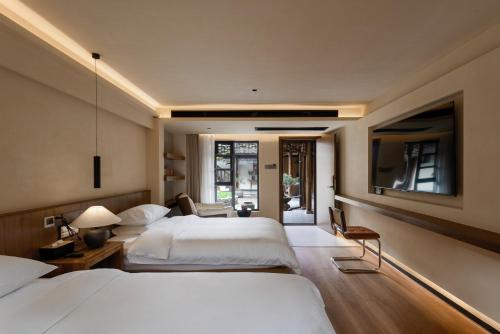 Budget Twin Room room in Hongcun Nanhu Guanyuan Designer Lake View Resort Hotel Scenic spot tickets are not included