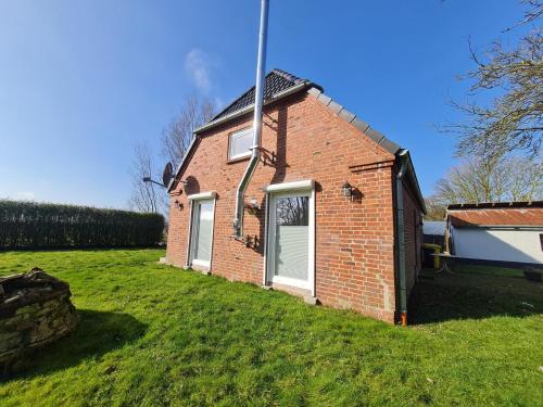 Viesnīcas āriene, Ferienhaus im Koog in Tetenbüll