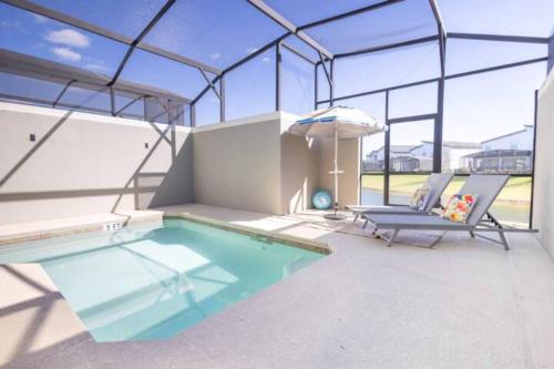 Charming 4BR with Private Heated Pool & BBQ Grill, Kissimmee (foto 9)