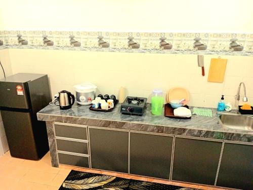 Dom (93 m²) w okolicy Jasin z 3 sypialnią/ami i 2 łazienką/ami (Homestay  Najihah Taman Jasin Height -3 bedrooms) in Jasin