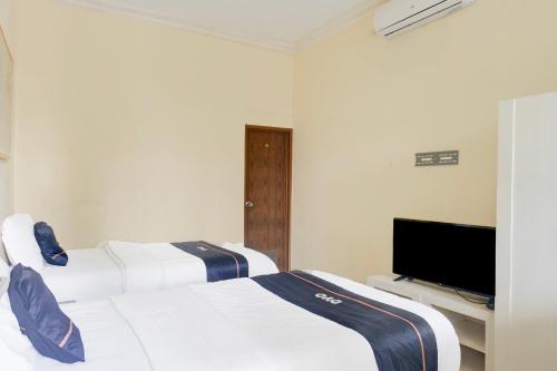 Delxue Twin Room image 6