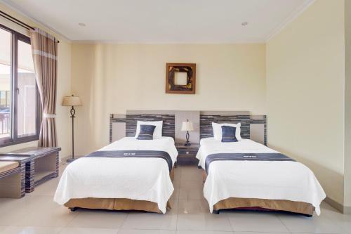 Superior Twin Room room in Hotel O Bogor near Taman Safari formerly Ken Raudhah Inn