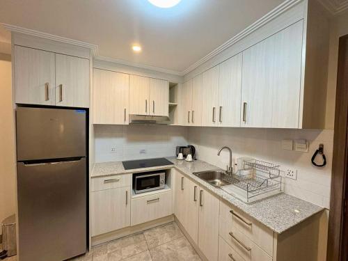 Sheryll Escapes - La Grande 11th floor, Phase 2, luxury 1BR balcony, Angeles (foto 4)