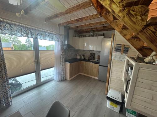 ''Kaszebe ''Domek letniskowy całoroczny z jacuzzi ,klimatyzacja nad jeziorem Raduńskim (''Kaszebe ''Domek letniskowy caloroczny z jacuzzi ,klimatyzacja nad jeziorem Radunskim) in Złota Góra