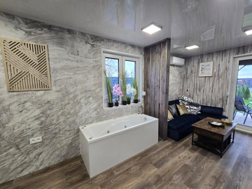 Nowy York - Sauna - Jacuzzi - Najczystsze jezioro PL - SPA - STYRUŚ (Nowy York - Sauna - Jacuzzi - Najczystsze jezioro PL - SPA - STYRUS) in Gevartuva