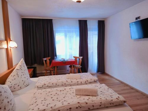 صالة مشتركة/ منطقة التلفزيون, Gastehaus Alpenruh in هولزجاو