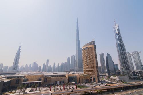 Elite Escape Holiday Home - 2 BHK Getaway with Burj Khalifa View and Dubai Mall Access - 1507, Дубай (фото 2)