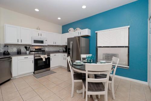 Caribbean Breeze- 4 bedroom lake view home with a private pool close to Disney! - main image