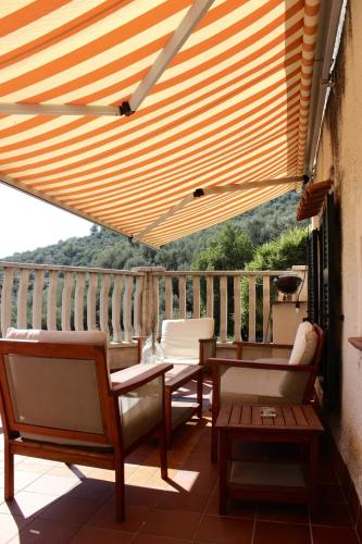 HOST4U - Cozy Terraced House with Beautiful View on the Olives Valley, Montegrazie
