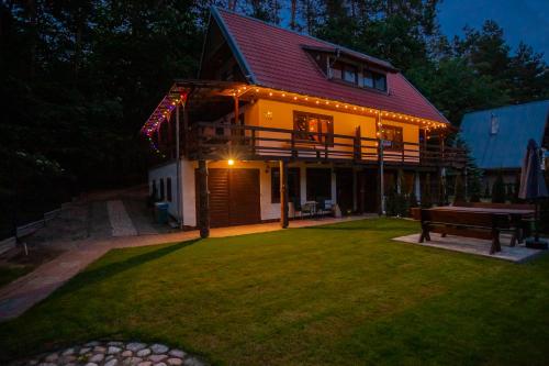 ZIEMIA-OGIEŃ Apartamenty Mazurska Kraina Narie