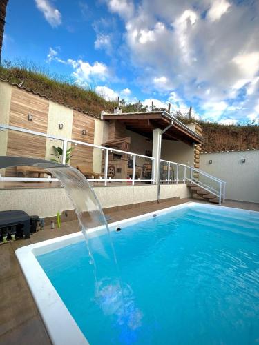 Casa com Piscina em Marmelópolis (Casa com Piscina em Marmelopolis) in Marmelópolis