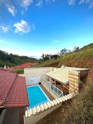 Casa com Piscina em Marmelópolis (Casa com Piscina em Marmelopolis) in Marmelópolis