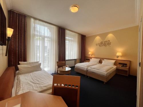 Hotel Mack Room Type - Classic Triple Room