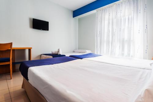 Double or Twin Room with Extra Bed (3 Adults)