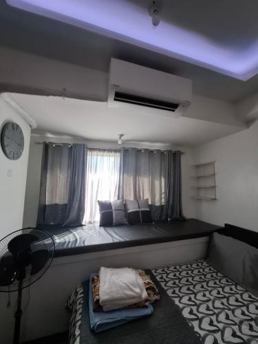 QUINS STAYCATION One Bedroom at SMDC South Residences, Manila (fotografie 6)